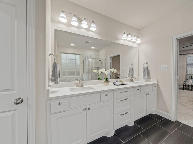 413 Winehart St, Lewisville, TX 75056 - full bath with a shower stall, double vanity, and healthy amount of natural light