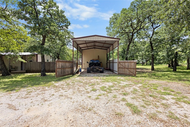 108 Boca Vista Ct, Chico, TX 76431 - view of yard featuring a carport, driveway, and a pole building