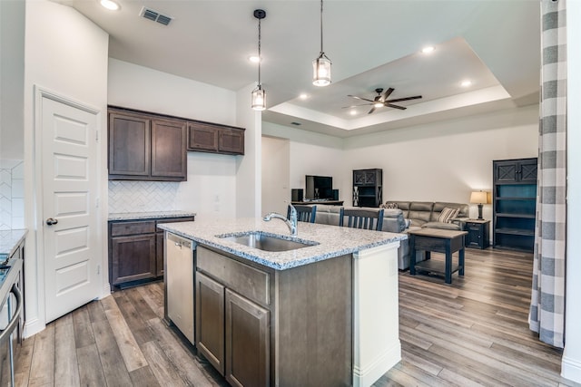 200 Tallgrass Dr, Lavon, TX 75166 - kitchen with a sink, ceiling fan, wood finished floors, tasteful backsplash, and recessed lighting
