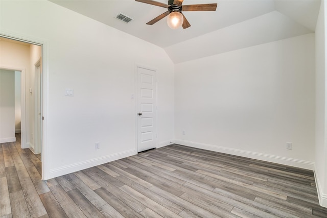 200 Tallgrass Dr, Lavon, TX 75166 - spare room featuring a ceiling fan, wood finished floors, lofted ceiling, and baseboards