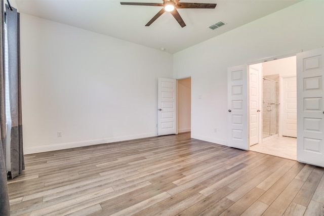 200 Tallgrass Dr, Lavon, TX 75166 - unfurnished bedroom with light wood-style flooring, baseboards, connected bathroom, and a ceiling fan