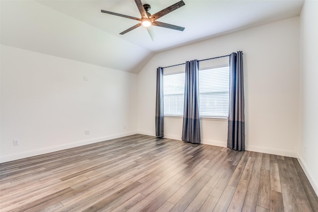 200 Tallgrass Dr, Lavon, TX 75166 - empty room with a ceiling fan, wood finished floors, lofted ceiling, and baseboards
