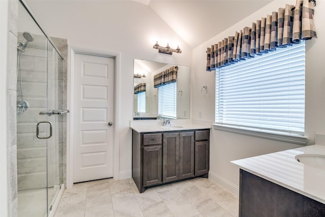 200 Tallgrass Dr, Lavon, TX 75166 - full bathroom with vanity, a stall shower, lofted ceiling, baseboards, and tile patterned flooring