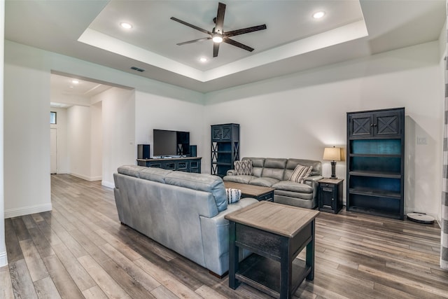 200 Tallgrass Dr, Lavon, TX 75166 - living room with a ceiling fan, wood finished floors, a raised ceiling, baseboards, and recessed lighting