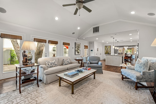 5507 W Amherst Ave, Dallas, TX 75209 - living room featuring vaulted ceiling, ceiling fan, light wood-style flooring, plenty of natural light, and recessed lighting