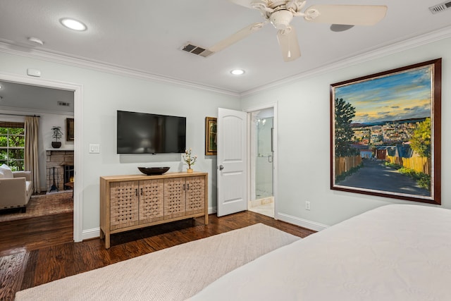 5507 W Amherst Ave, Dallas, TX 75209 - bedroom with crown molding, baseboards, wood finished floors, recessed lighting, and connected bathroom