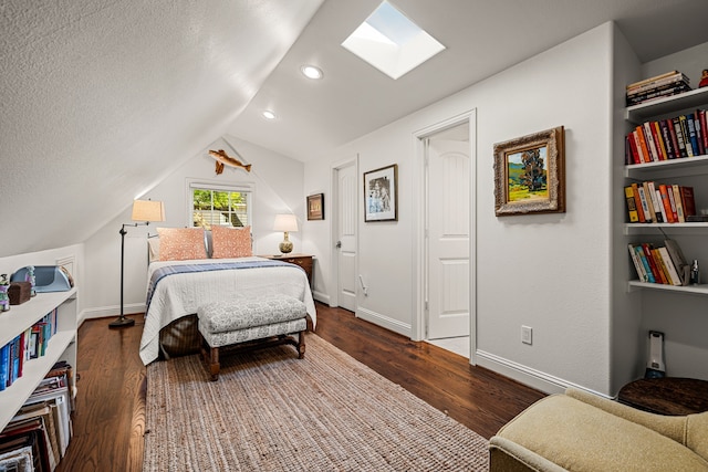 5507 W Amherst Ave, Dallas, TX 75209 - bedroom with a skylight, wood finished floors, vaulted ceiling, baseboards, and recessed lighting