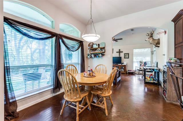4401 Oak Shores Cir, Cross Roads, TX 76227 - dining area with arched walkways and a ceiling fan