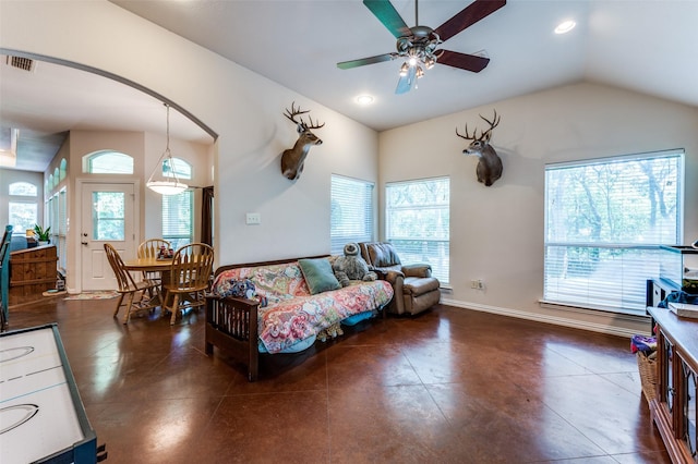 4401 Oak Shores Cir, Cross Roads, TX 76227 - tiled living area featuring arched walkways, ceiling fan, vaulted ceiling, and baseboards