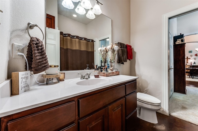 4401 Oak Shores Cir, Cross Roads, TX 76227 - bathroom with toilet, vanity, a chandelier, and a shower with shower curtain