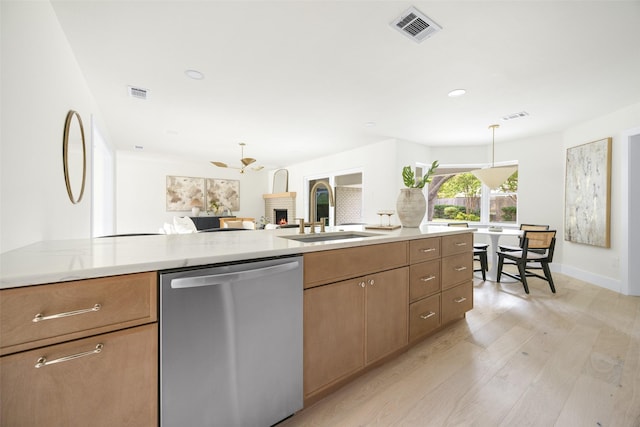 7716 Roundrock Rd, Dallas, TX 75248 - kitchen with dishwasher, light wood-type flooring, open floor plan, brown cabinetry, and recessed lighting
