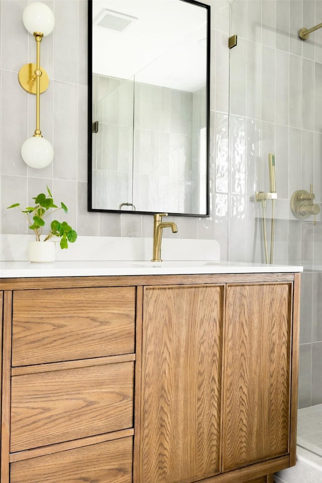 7716 Roundrock Rd, Dallas, TX 75248 - full bath with vanity, tiled shower, and tile walls