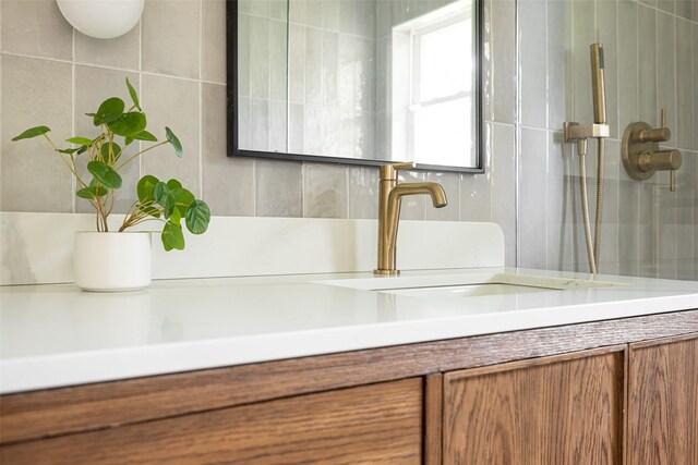 7716 Roundrock Rd, Dallas, TX 75248 - full bath with vanity, tile walls, and a shower