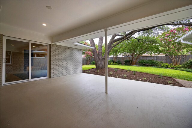7716 Roundrock Rd, Dallas, TX 75248 - fenced backyard with a patio area