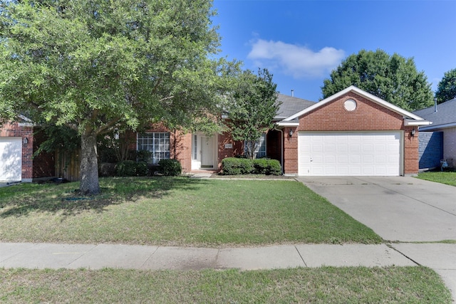 4546 Brittany Ln, Grand Prairie, TX 75052 - view of front of property featuring an attached garage, a front yard, concrete driveway, and brick siding