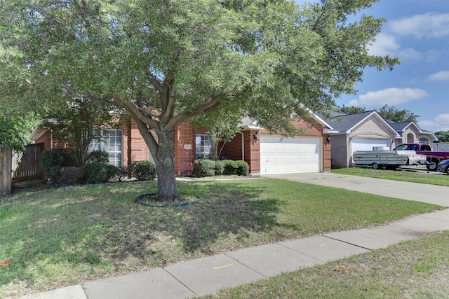 4546 Brittany Ln, Grand Prairie, TX 75052 - view of property hidden behind natural elements with an attached garage, brick siding, a front yard, and concrete driveway