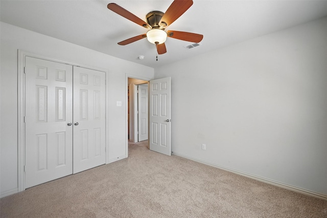 2932 Peyton Brook Dr, Fort Worth, TX 76137 - unfurnished bedroom with light carpet, a closet, ceiling fan, and baseboards