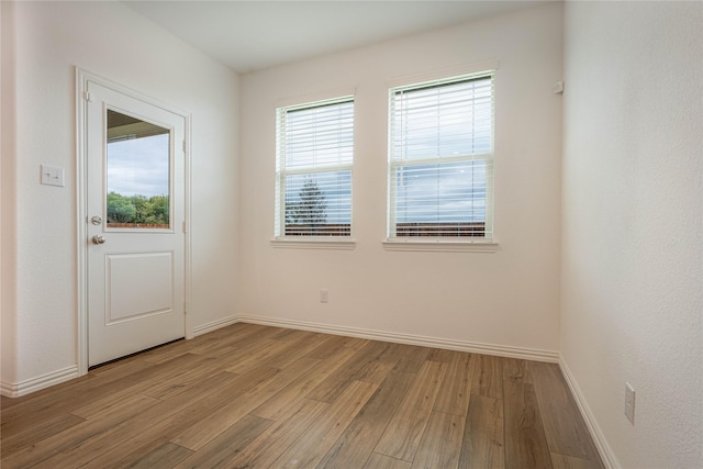 3616 Mallard Way, Mckinney, TX 75071 - empty room featuring light wood finished floors and baseboards