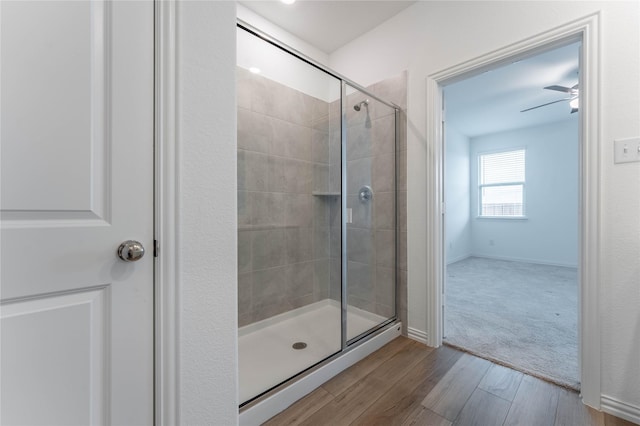 3616 Mallard Way, Mckinney, TX 75071 - bathroom with a shower stall, wood finished floors, and baseboards
