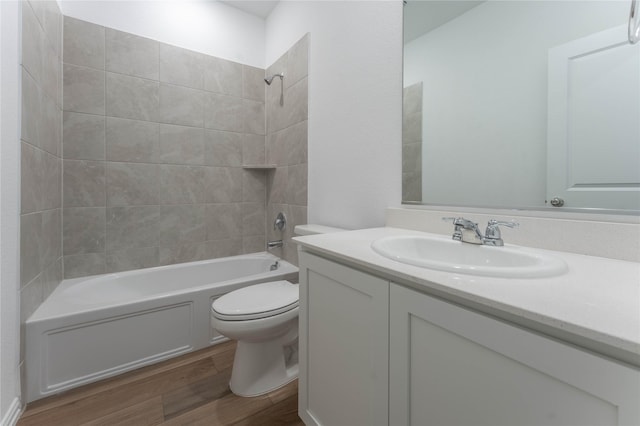 3616 Mallard Way, Mckinney, TX 75071 - bathroom with wood finished floors, vanity, toilet, and tub / shower combination