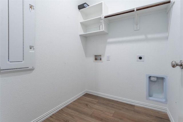 3616 Mallard Way, Mckinney, TX 75071 - laundry area featuring electric dryer hookup, wood finished floors, washer hookup, and baseboards
