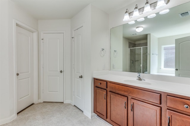 4201 Tower Ln, Crowley, TX 76036 - bathroom with a shower stall, vanity, and tile patterned flooring