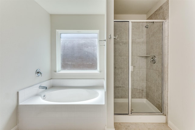 4201 Tower Ln, Crowley, TX 76036 - bathroom featuring a stall shower, a bath, and tile patterned flooring