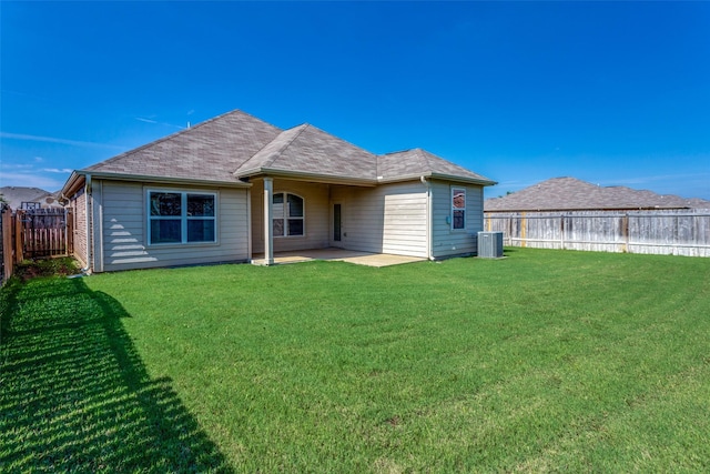 4201 Tower Ln, Crowley, TX 76036 - rear view of house featuring central AC, a patio area, and roof with shingles