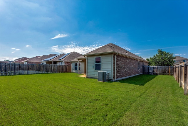 4201 Tower Ln, Crowley, TX 76036 - back of property featuring central AC and brick siding