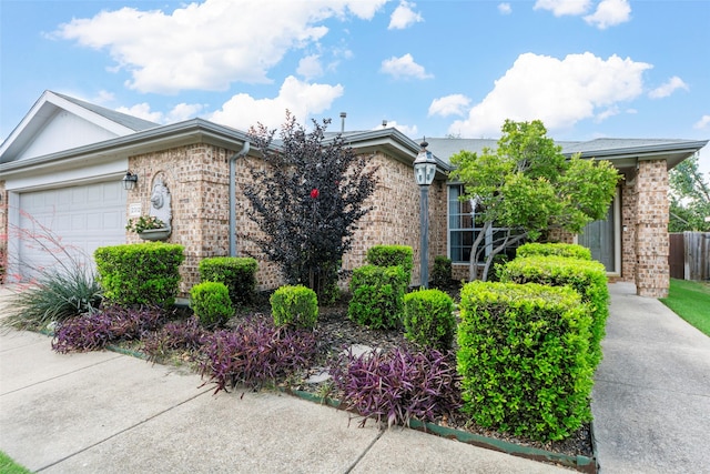 2312 Collier Dr, Mckinney, TX 75071 - view of front of property with brick siding and a garage
