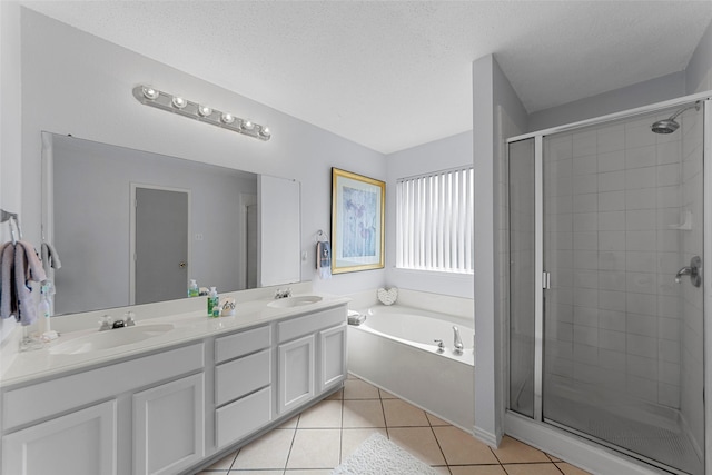 2312 Collier Dr, Mckinney, TX 75071 - full bath with a shower stall, a garden tub, double vanity, and tile patterned floors