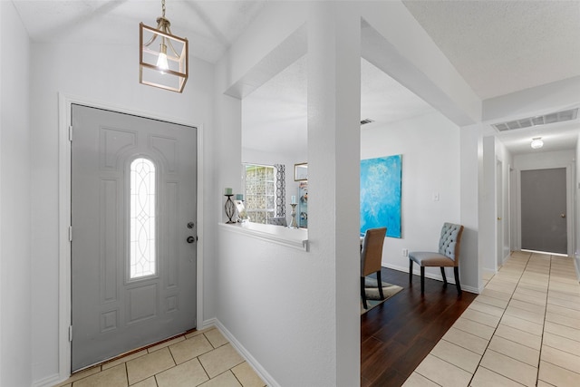 2312 Collier Dr, Mckinney, TX 75071 - tiled foyer entrance with baseboards