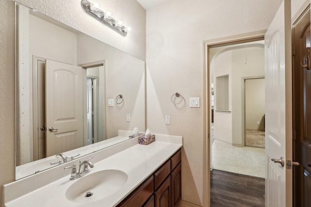 1336 Castlegar Ln, Fort Worth, TX 76247 - bathroom featuring vanity and wood finished floors