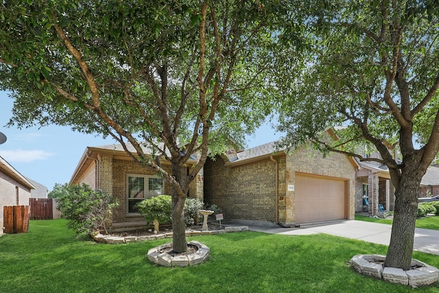 1336 Castlegar Ln, Fort Worth, TX 76247 - view of front of property with a garage, driveway, and brick siding