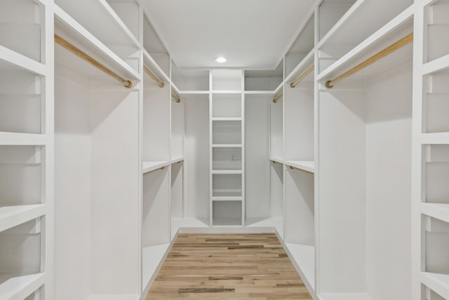 4216 Rickover Dr, Dallas, TX 75244 - walk in closet featuring light wood-type flooring