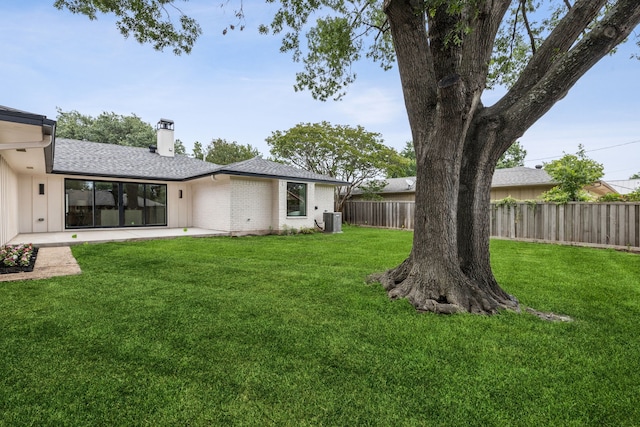 4216 Rickover Dr, Dallas, TX 75244 - view of yard featuring central AC unit and a patio area