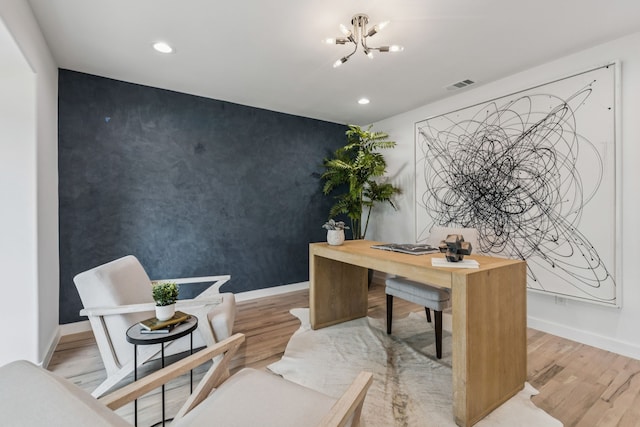 4216 Rickover Dr, Dallas, TX 75244 - office space with an accent wall, a chandelier, light wood-type flooring, recessed lighting, and baseboards
