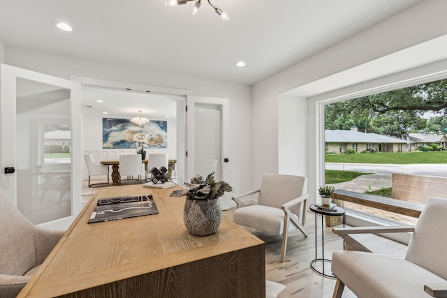 4216 Rickover Dr, Dallas, TX 75244 - living room with a chandelier, light wood-style floors, and recessed lighting
