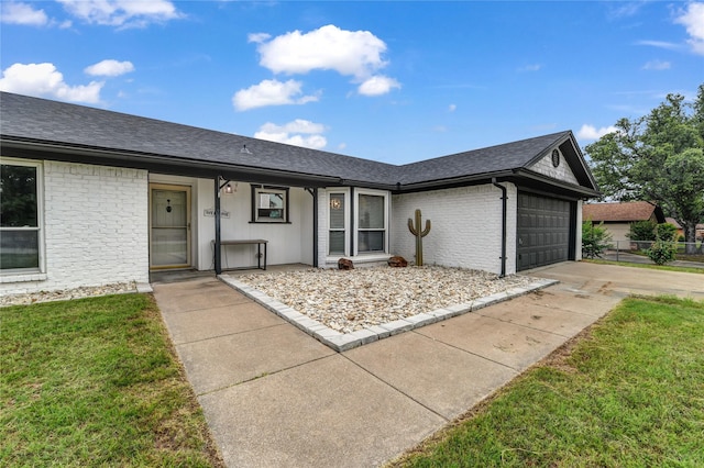 716 Vickie Dr, Azle, TX 76020 - ranch-style house with a garage, roof with shingles, driveway, a front lawn, and brick siding