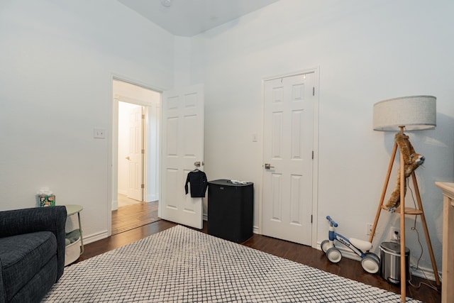 1005 Ruidoso Downs Dr, Talty, TX 75160 - bedroom with dark wood-style flooring