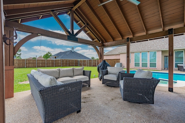 1005 Ruidoso Downs Dr, Talty, TX 75160 - fenced backyard with outdoor lounge area and a patio