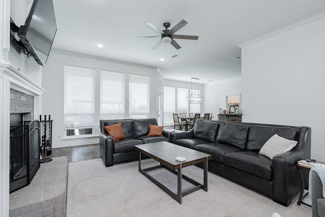 1005 Ruidoso Downs Dr, Talty, TX 75160 - living room featuring crown molding, ceiling fan, a brick fireplace, and recessed lighting