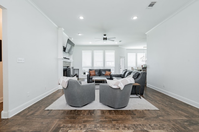 1005 Ruidoso Downs Dr, Talty, TX 75160 - living room with a ceiling fan, crown molding, a fireplace, recessed lighting, and parquet flooring