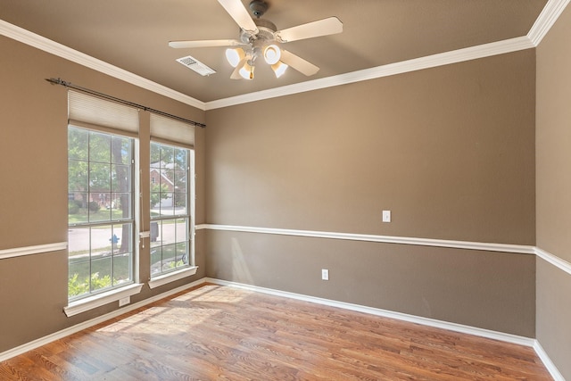 1908 Canyon Wren Dr, Mckinney, TX 75071 - unfurnished room with healthy amount of natural light, wood finished floors, baseboards, and crown molding