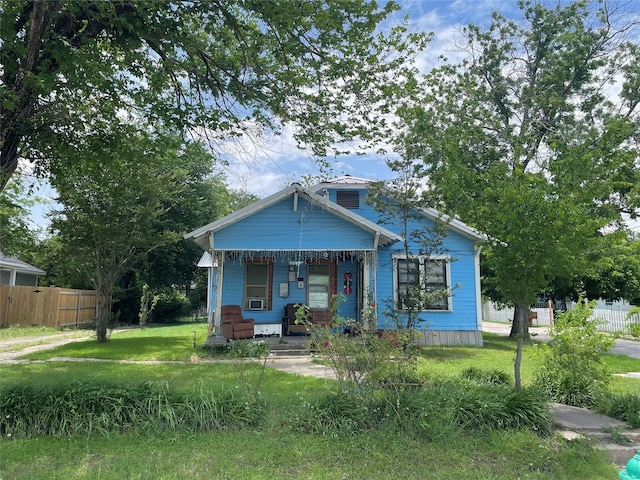 1206 Walnut St, Greenville, TX 75401 - view of front of home with covered porch