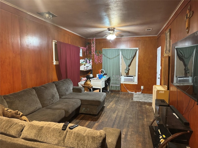 1206 Walnut St, Greenville, TX 75401 - living room with a ceiling fan, dark wood-type flooring, wooden walls, crown molding, and cooling unit