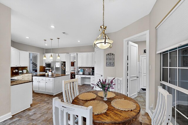 4700 Scoter Ln, Mckinney, TX 75072 - dining area with recessed lighting and baseboards