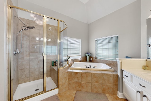 4700 Scoter Ln, Mckinney, TX 75072 - bathroom with a bath, a shower stall, vanity, tile patterned floors, and lofted ceiling