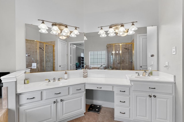 4700 Scoter Ln, Mckinney, TX 75072 - full bathroom with a chandelier, a stall shower, double vanity, and tile patterned flooring