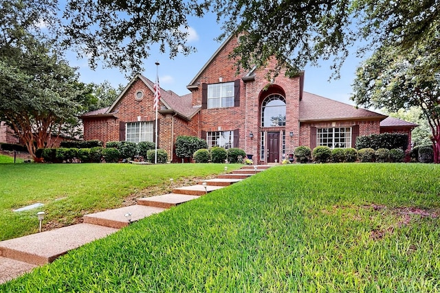 4700 Scoter Ln, Mckinney, TX 75072 - traditional home featuring brick siding and a front lawn